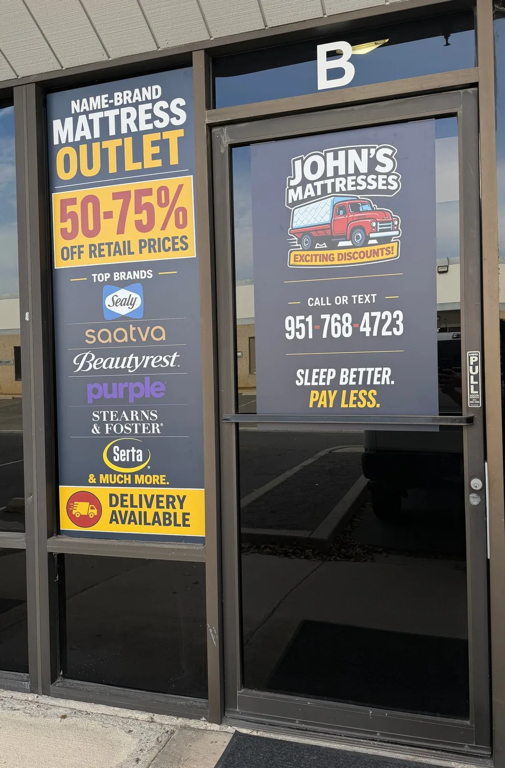 The John's Mattresses storefront in Corona: window signage reading Name Brand Mattress Outlet, 50-75% off retail prices, with the brands carried and the phone number